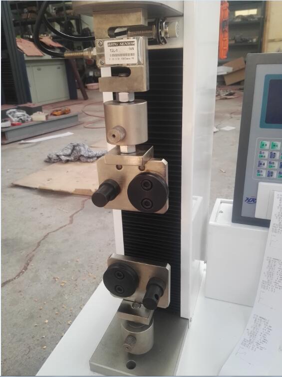 1675993302764556.jpg 縫合線拉伸疲勞試驗(yàn)機(jī).jpg